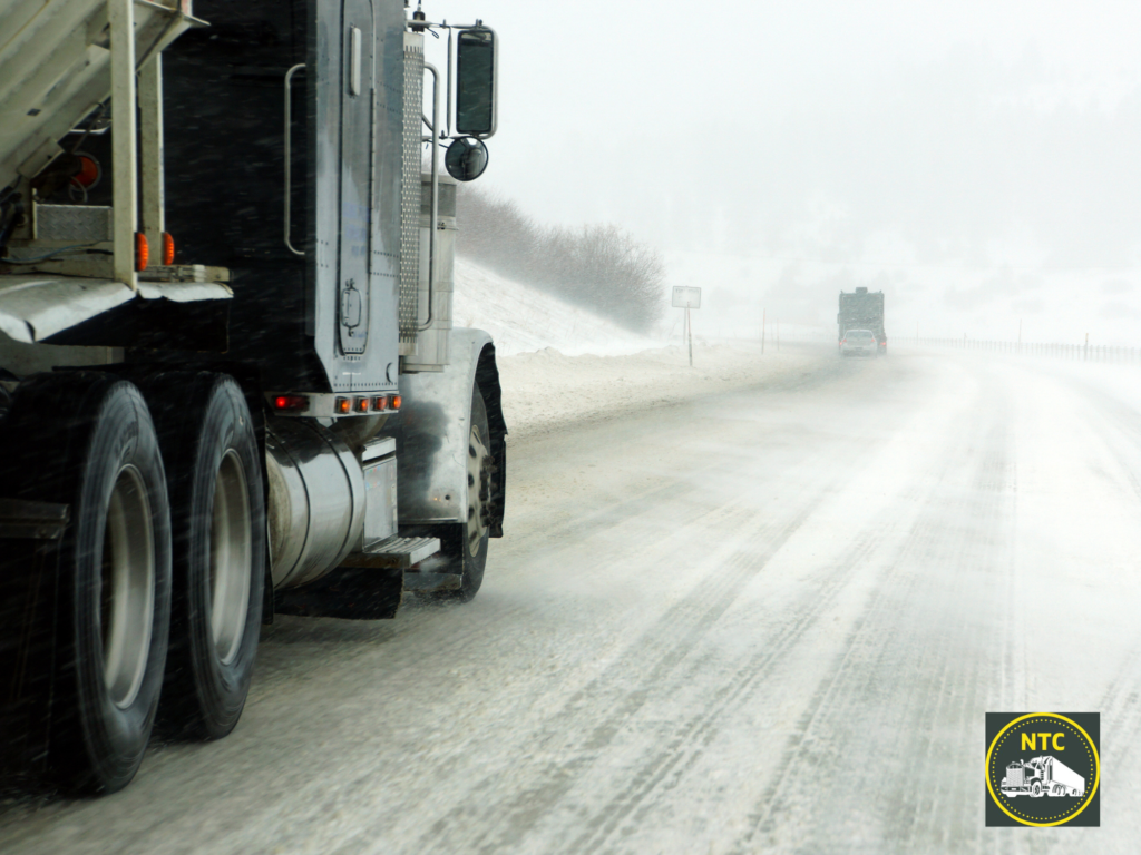 semi-truck driving in inclement weather